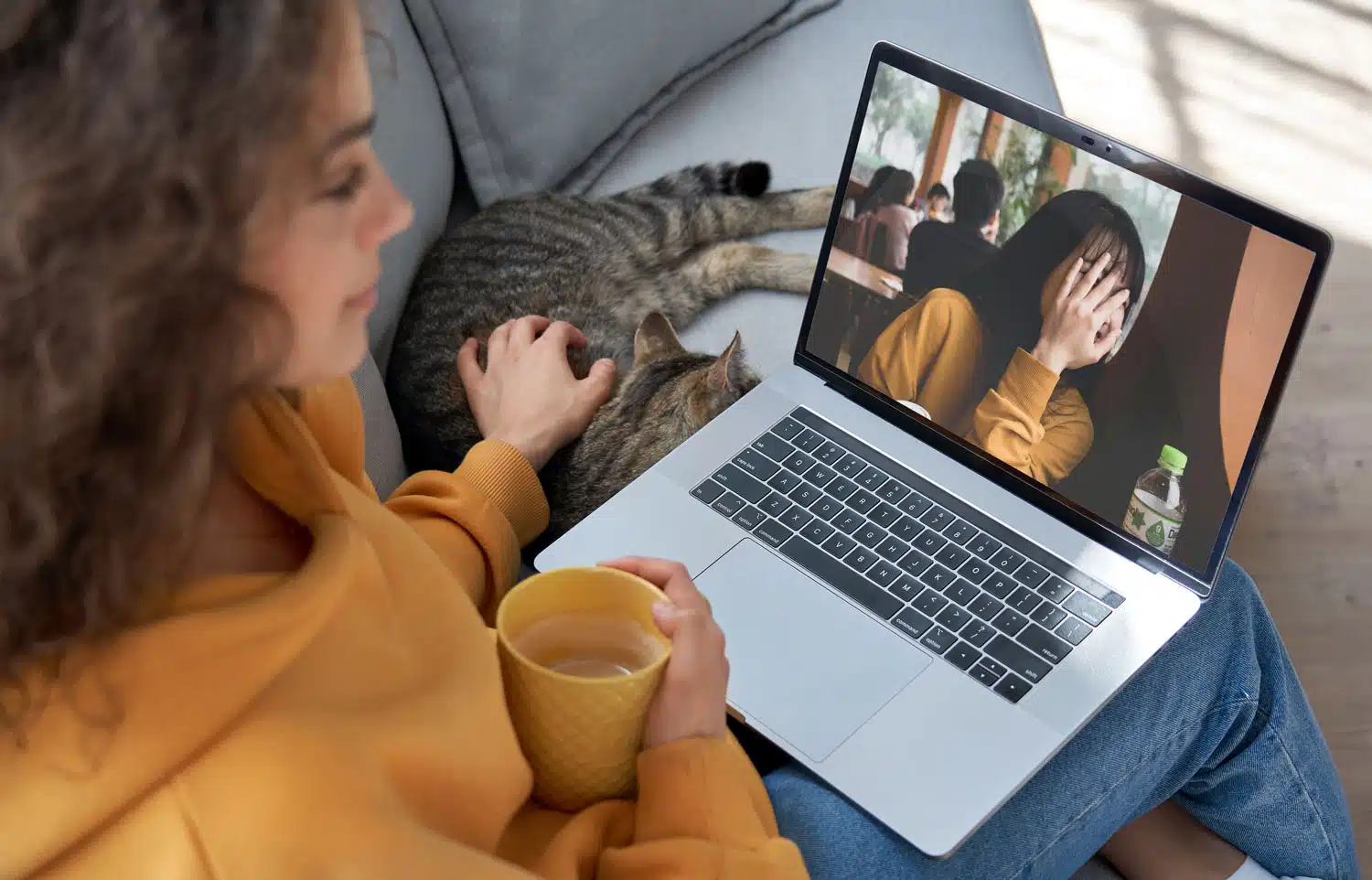 Shy girl on a computer