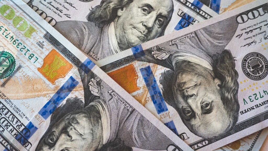 A stack of one hundred dollar bills